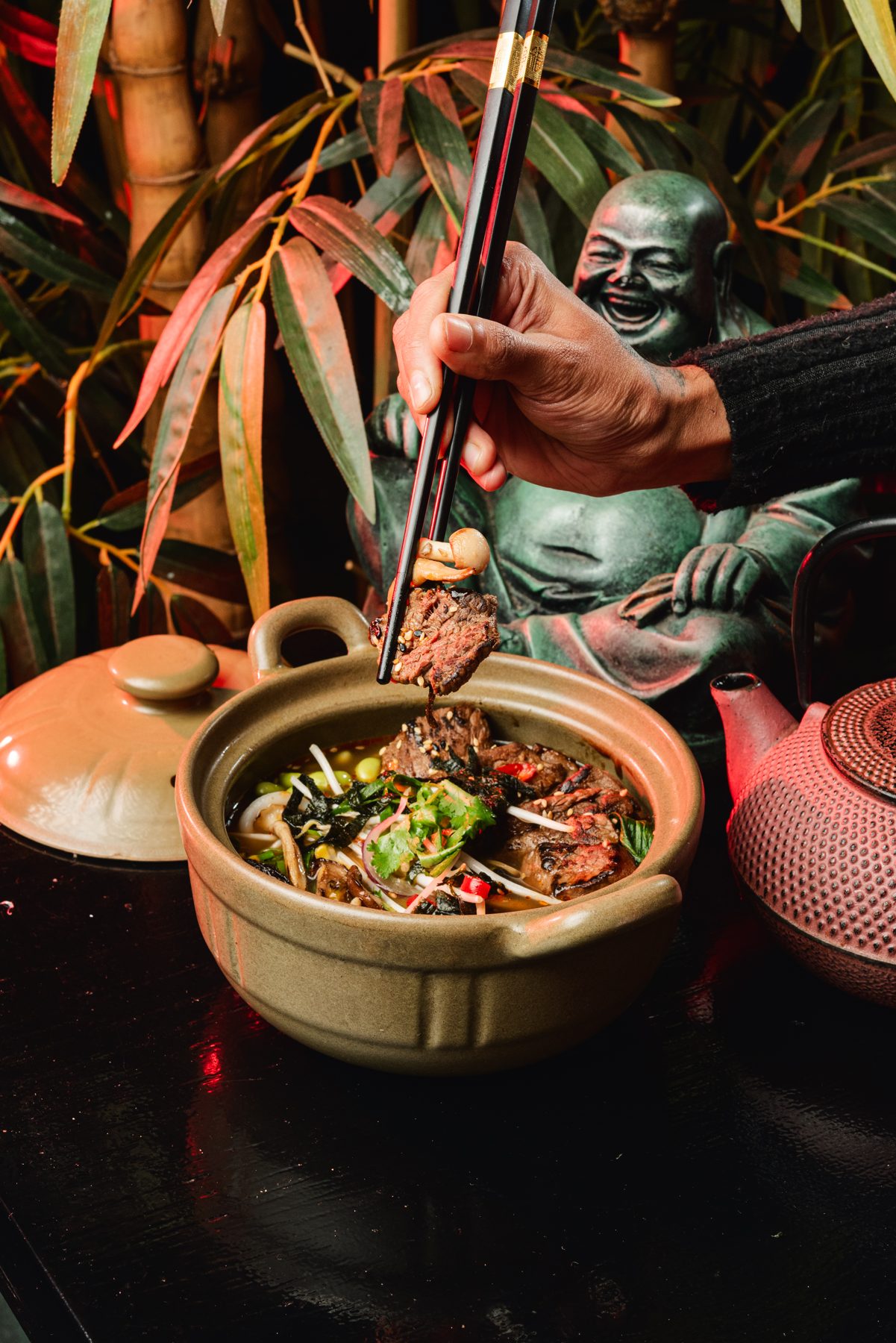 The Chau lucky Buddha — emerald greenery in the dining room